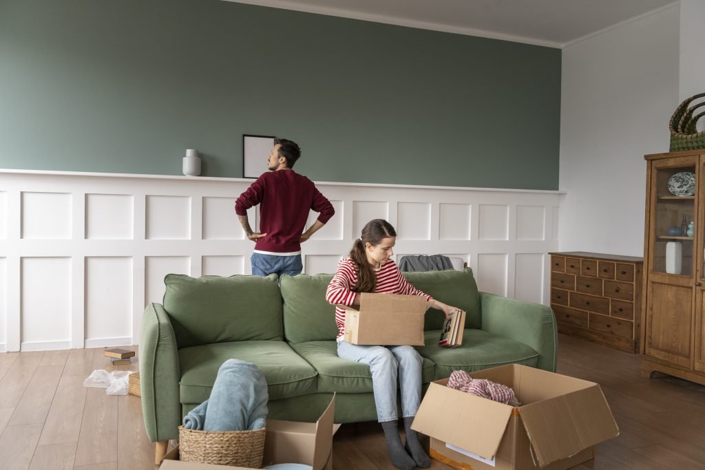 young family moving out of their house