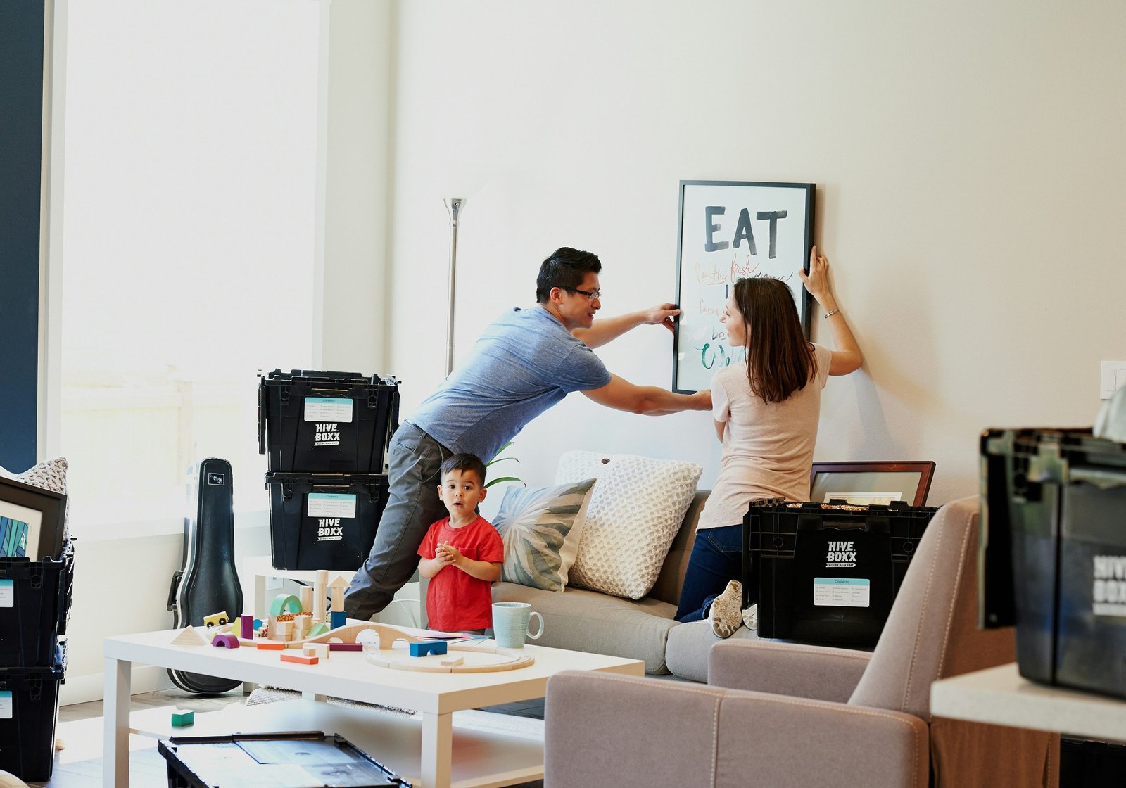 a family moving in to a new place for cleaning