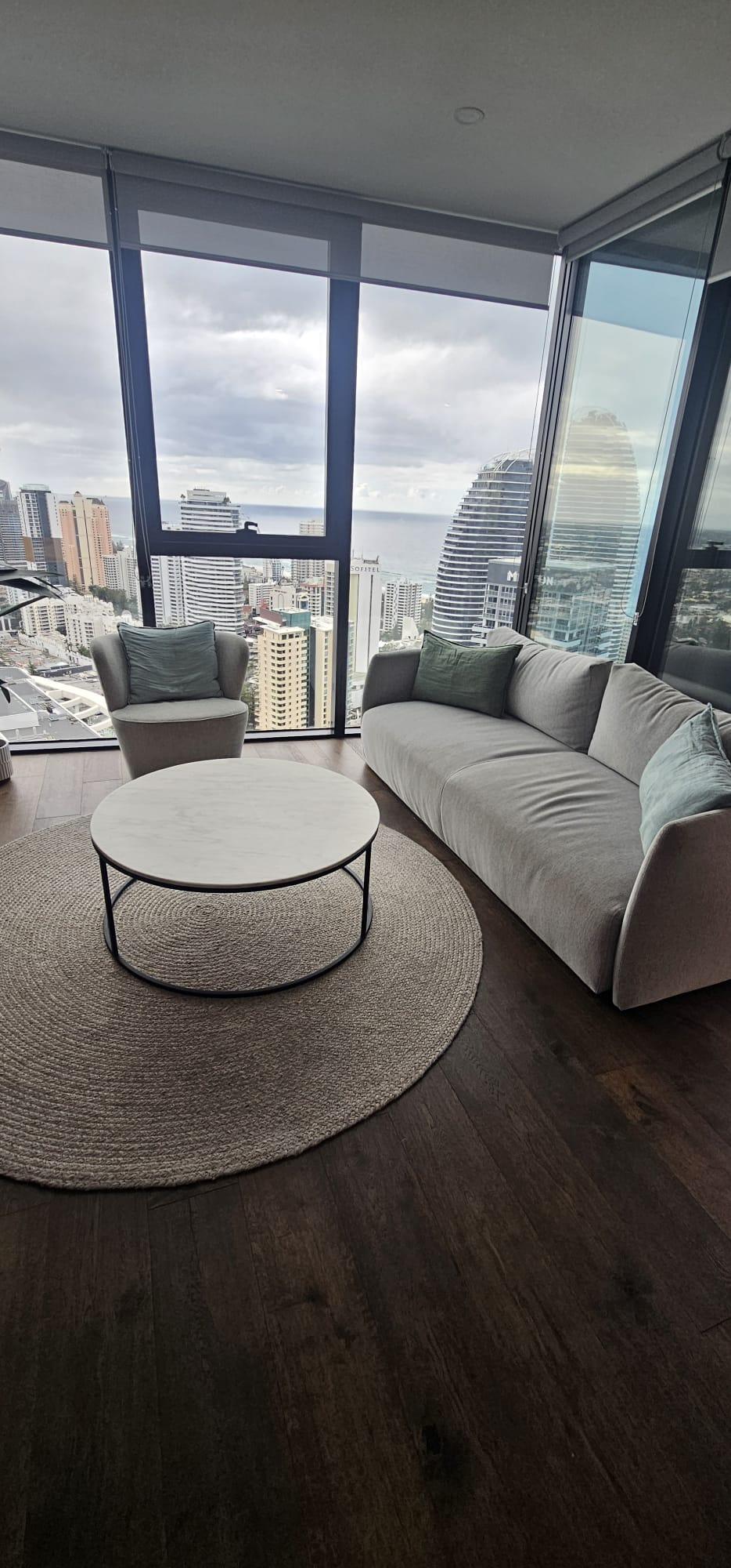 Freshly cleaned living room and rug after a Blue On Time clean