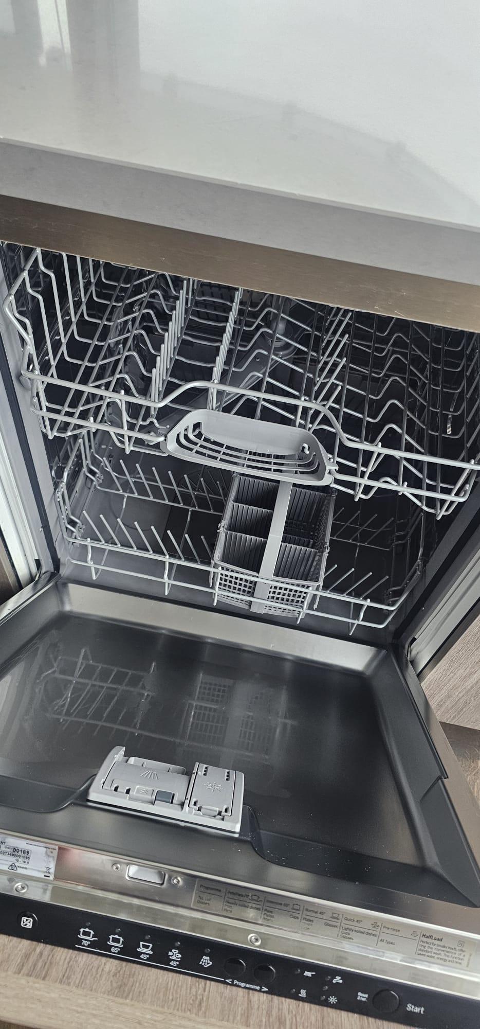 Spotless dishwasher after appliance detailing by Blue On Time