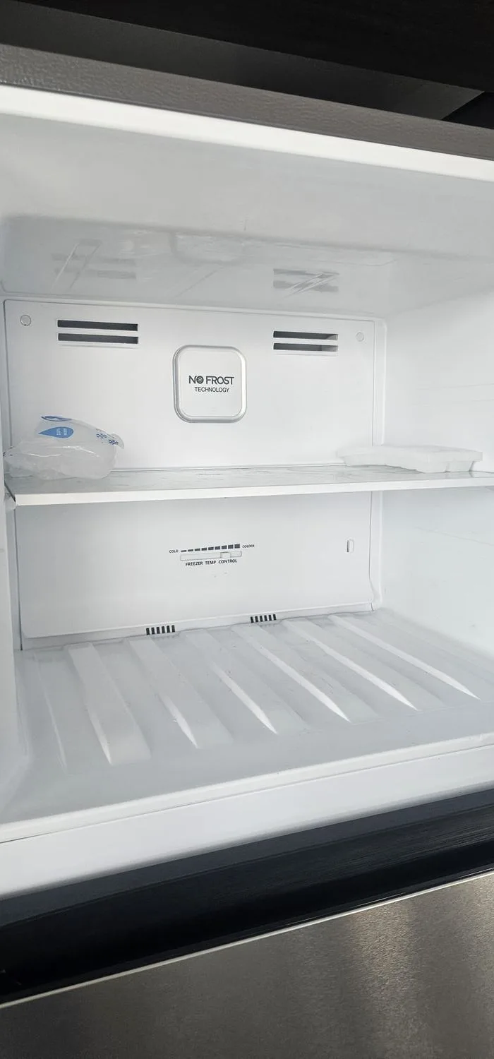 Clean fridge and freezer interior after bond cleaning in a Gold Coast rental